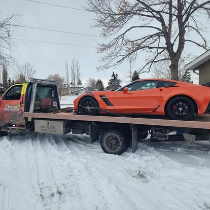 Dave's Towing: Orange Corvette Z06 Winter Flatbed Tow in Calgary
