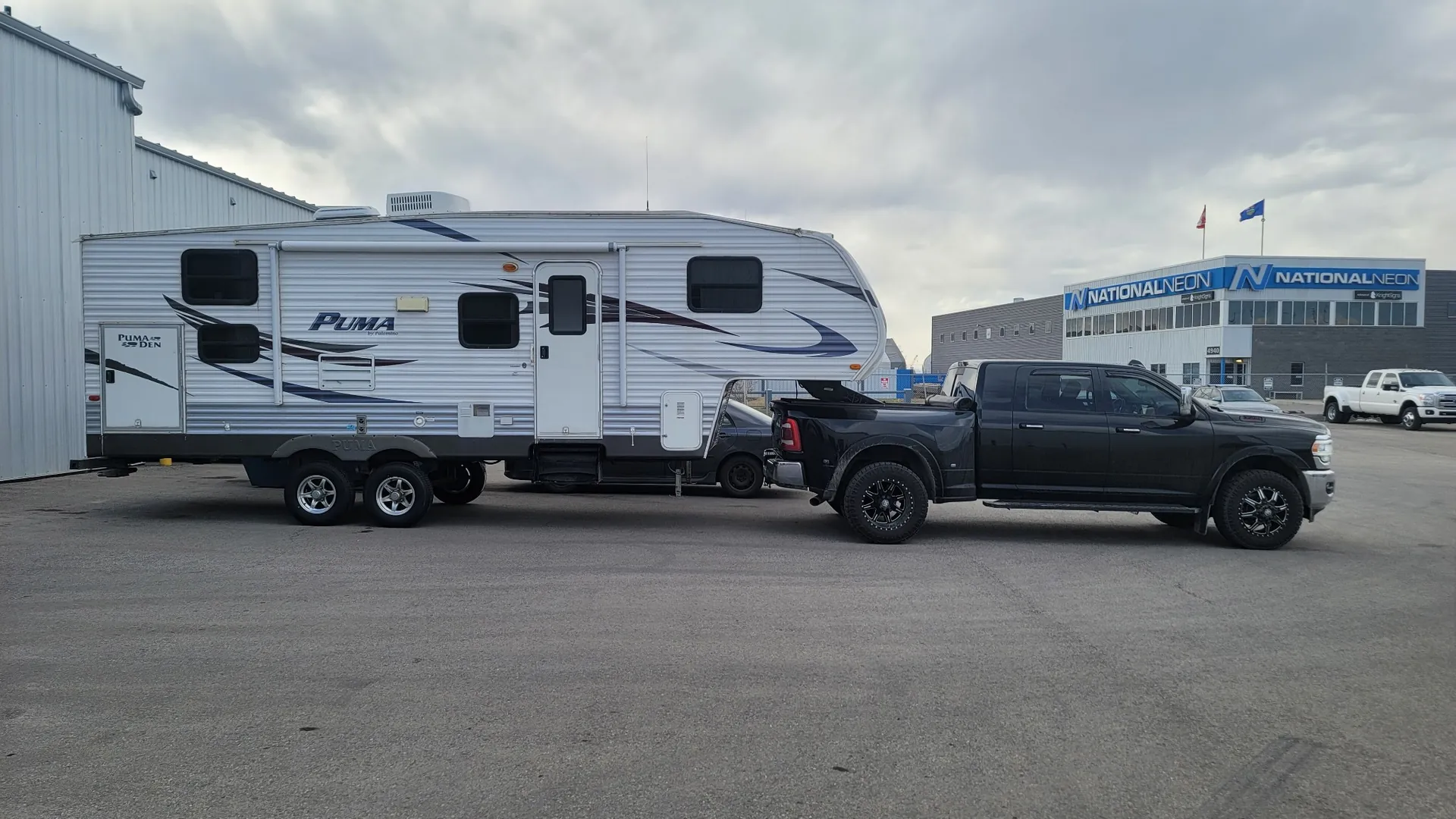 Dave's Towing transporting a fifth-wheel trailer in Calgary